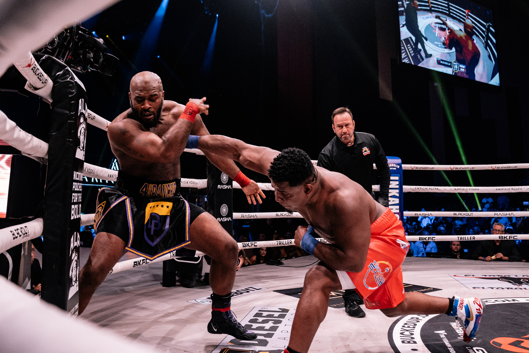 Perdomo lands punch against Adams.
